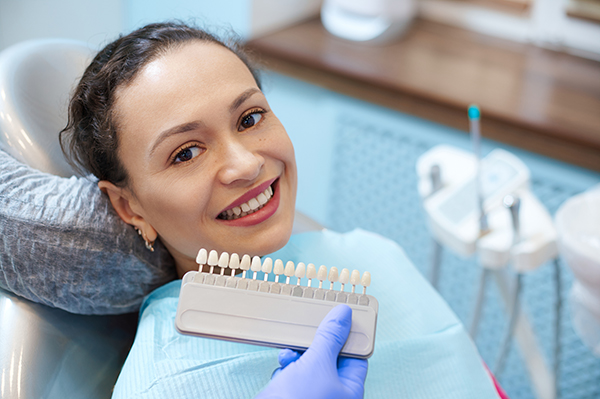 Brunette Woman With Beautiful Smile Before Receiving Dental Care